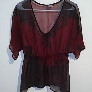 Merlot sheer colored shirt.